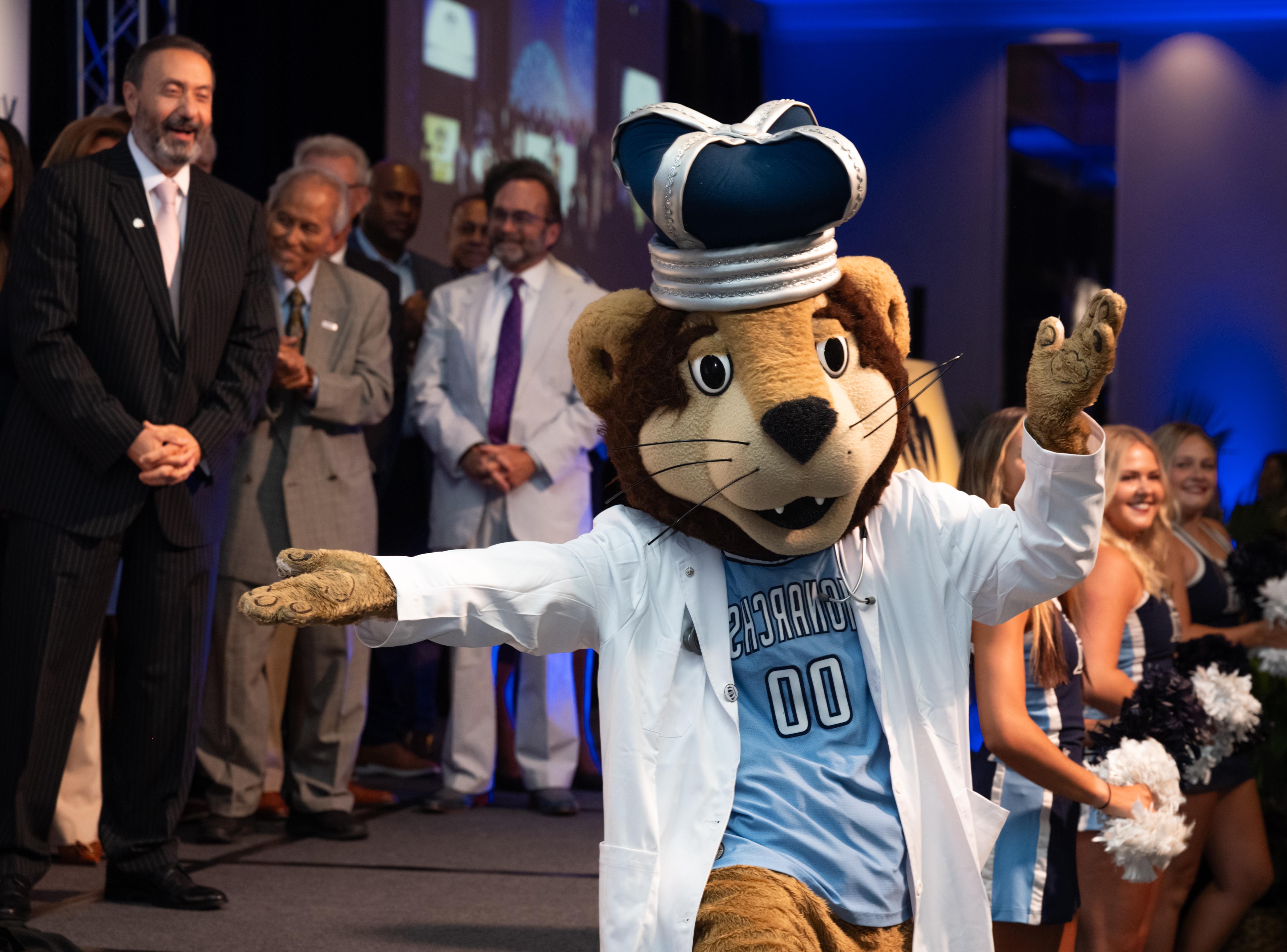 odu mascot in white lab coat